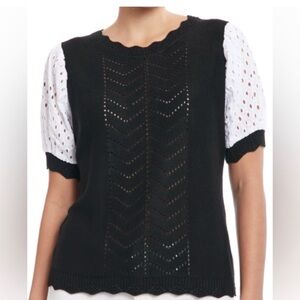 Joseph A. knit sweater with white eyelet puff sleeve in black
woman's size Large
